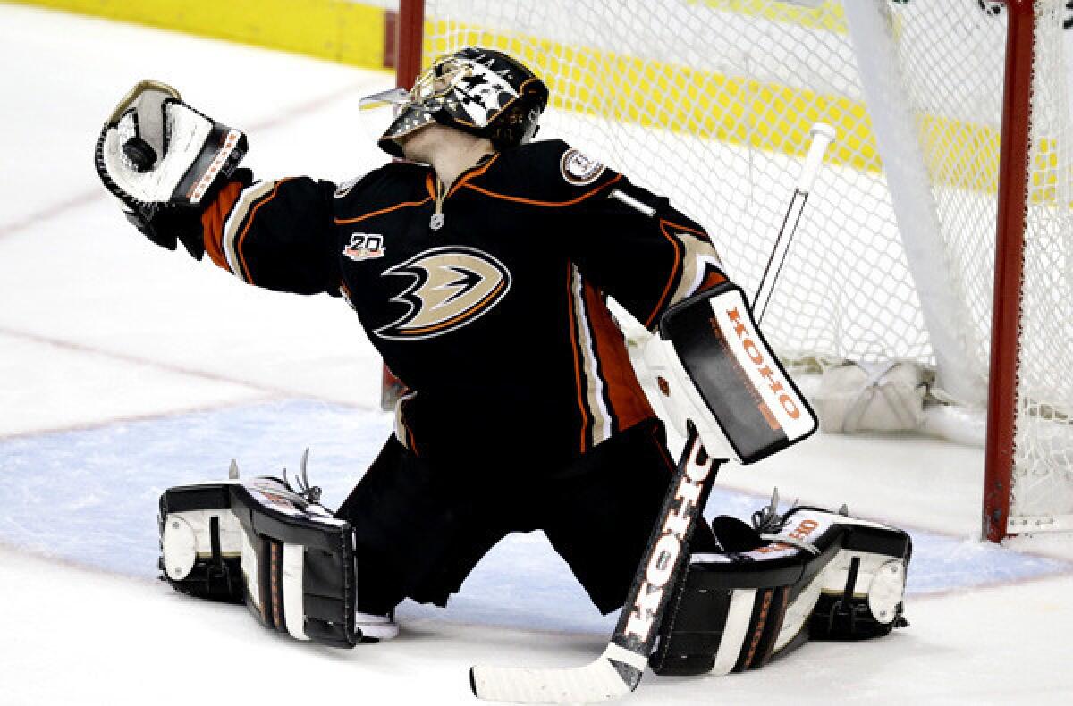 Ducks goalie Jonas Hiller makes a save against the Sharks during the second period of a game last week at the Honda Center in Anaheim.