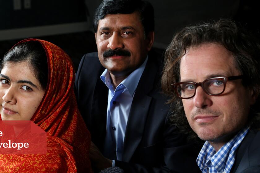 The relationship between Nobel Peace Prize laureate Malala Yousafzai, from left, and her father, Ziauddin Yousafzai, is the focus of documentarian Davis Guggenheim's "He Named Me Malala."
