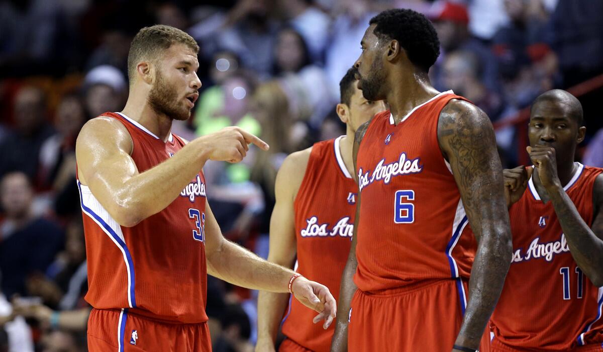 Clippers big men Blake Griffin (32) and DeAndre Jordan (6) can often be seen talking about defensive strategy during a game.