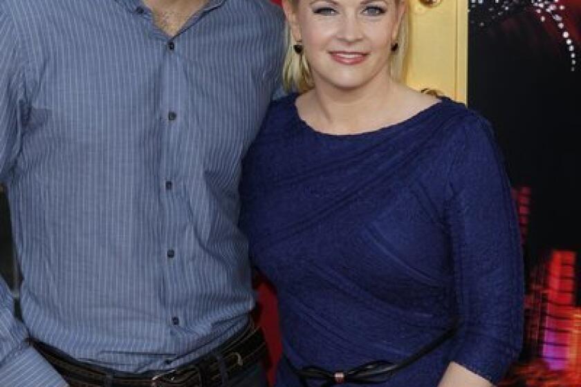 Melissa Joan Hart and husband Mark Wilkerson attend a movie premiere in March.
