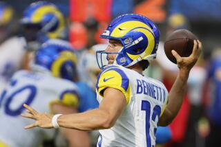 Inglewood, CA - August 17: Rams quarterback Stetson Bennett passes the ball.