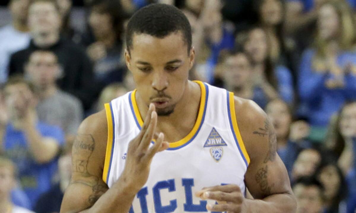 UCLA guard Norman Powell celebrates a three-pointer during Sunday's win over Arizona State.