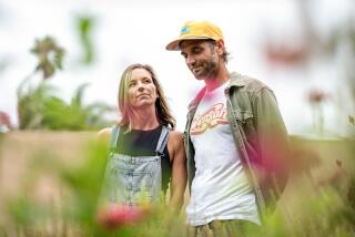 VENTURA, CA - SEPTEMBER 29: Portrait of Chad and Stacie Vanags among the love and serenity of their flower farm, 'Teaquila Farm', on Friday, Sept. 29, 2023 in Ventura, CA. (Mariah Tauger / Los Angeles Times)