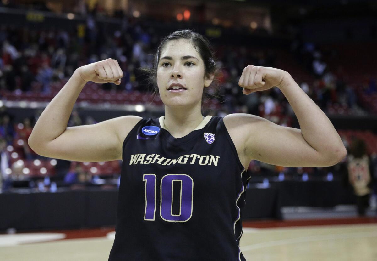 Washington guard Kelsey Plum gestures to fans after the Huskies beat Maryland in the NCAA tournament to advance to the Sweet 16.