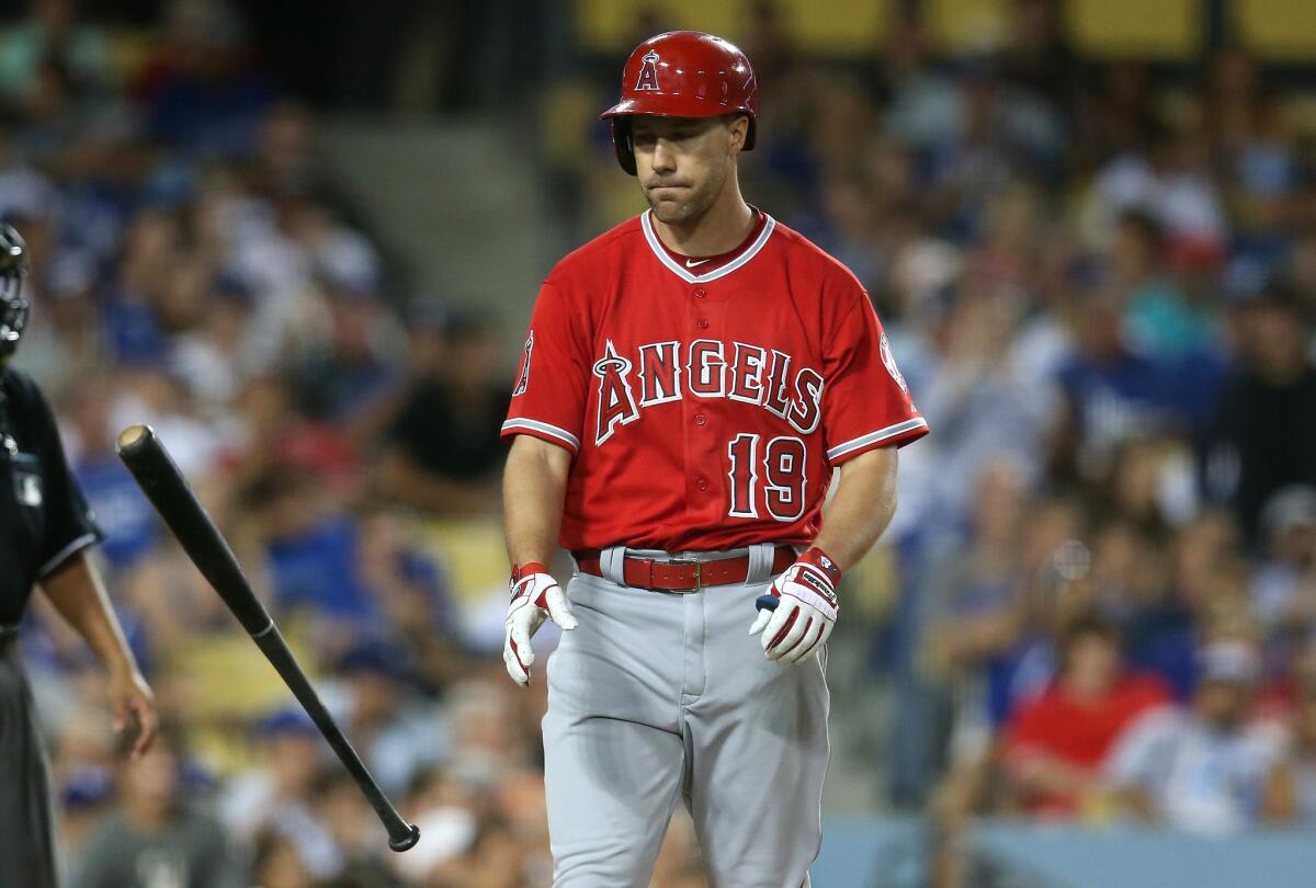 Angels outfielder David Murphy flips his bat after striking out against the Dodgers on July 31.