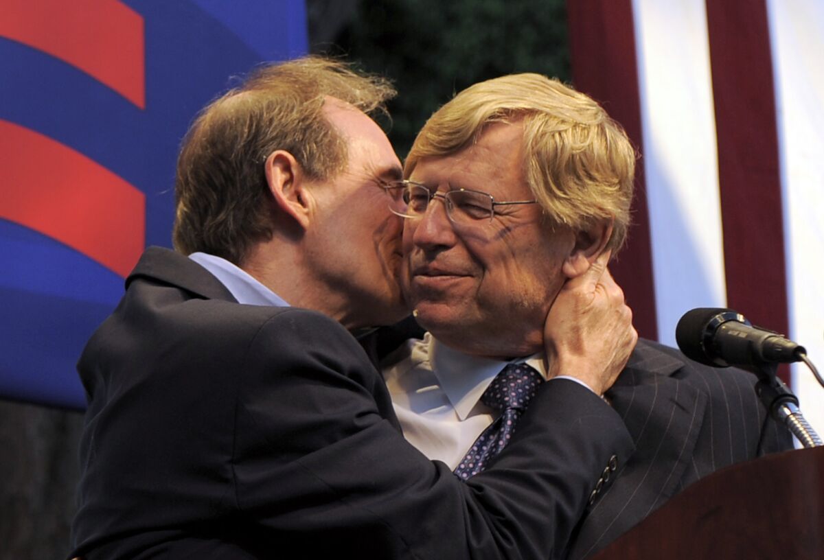 Attorney David Boies, left, kisses fellow lawyer Ted Olson on the cheek in 2010 at a rally in West Hollywood. The two, who had worked on opposite sides of the presidential-election-determining Bush v. Gore case in 2000, teamed to defeat California's gay-marriage ban. That effort is chronicled in "The Case Against 8."