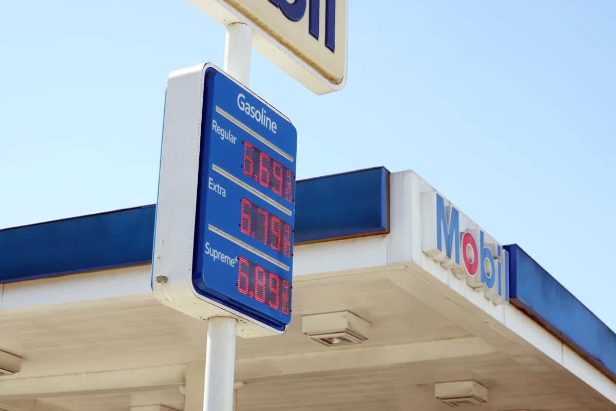 A Mobil gas station displays gas prices over $6 per gallon