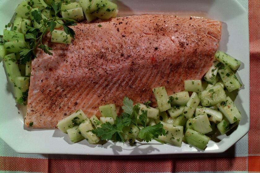 Oven-steamed salmon with cucumber salad.