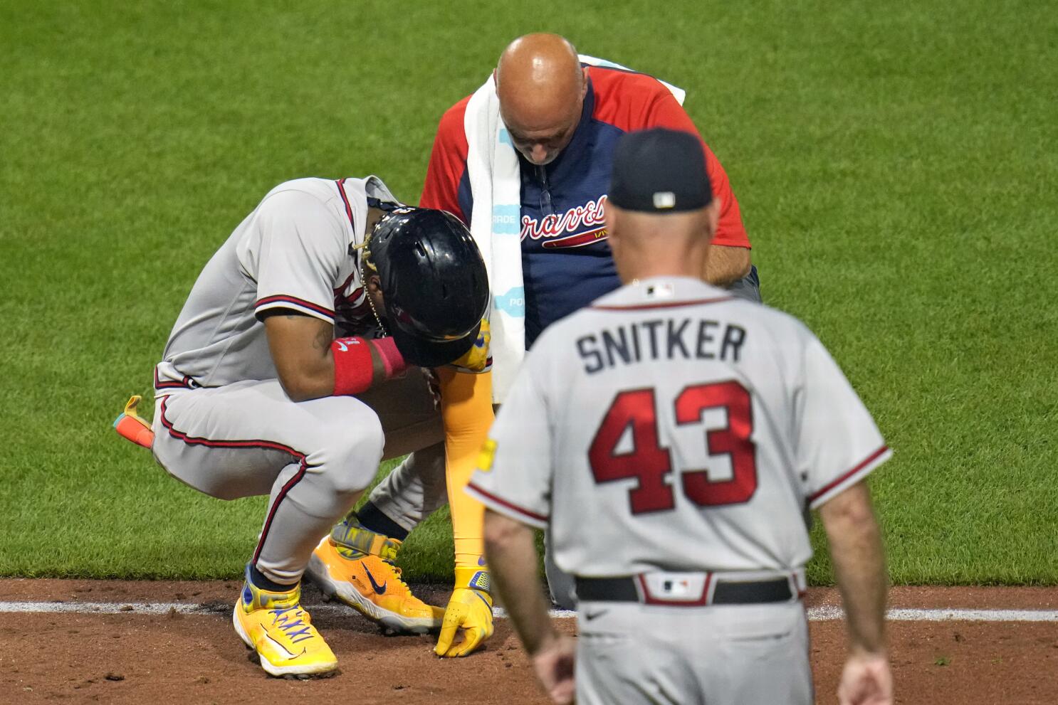 Braves' Ronald Acuña Jr. hit on the left elbow by a pitch, leaves game;  X-rays negative - The San Diego Union-Tribune