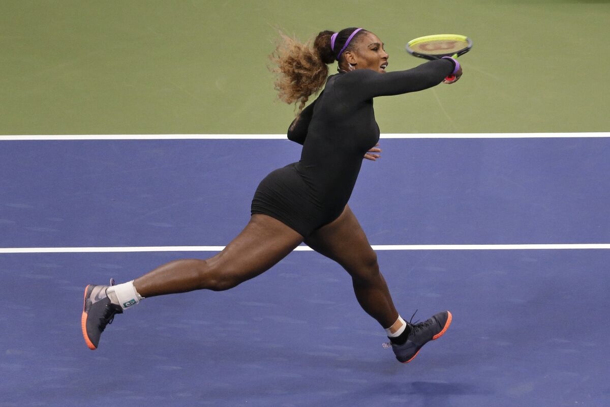 Serena Williams follows through on a forehand during her victory over Wang Qiang on Tuesday.