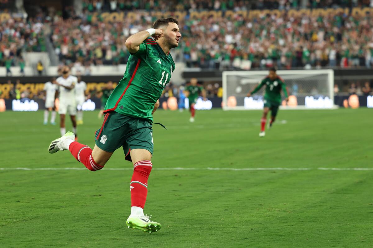 Santiago Giménez celebrates after scoring in the 88th minute for Mexico in a 1-0 victory