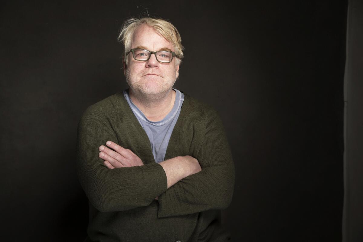 In this Jan. 19, 2014 file photo, Philip Seymour Hoffman poses for a portrait at The Collective and Gibson Lounge Powered by CEG, during the Sundance Film Festival, in Park City, Utah.