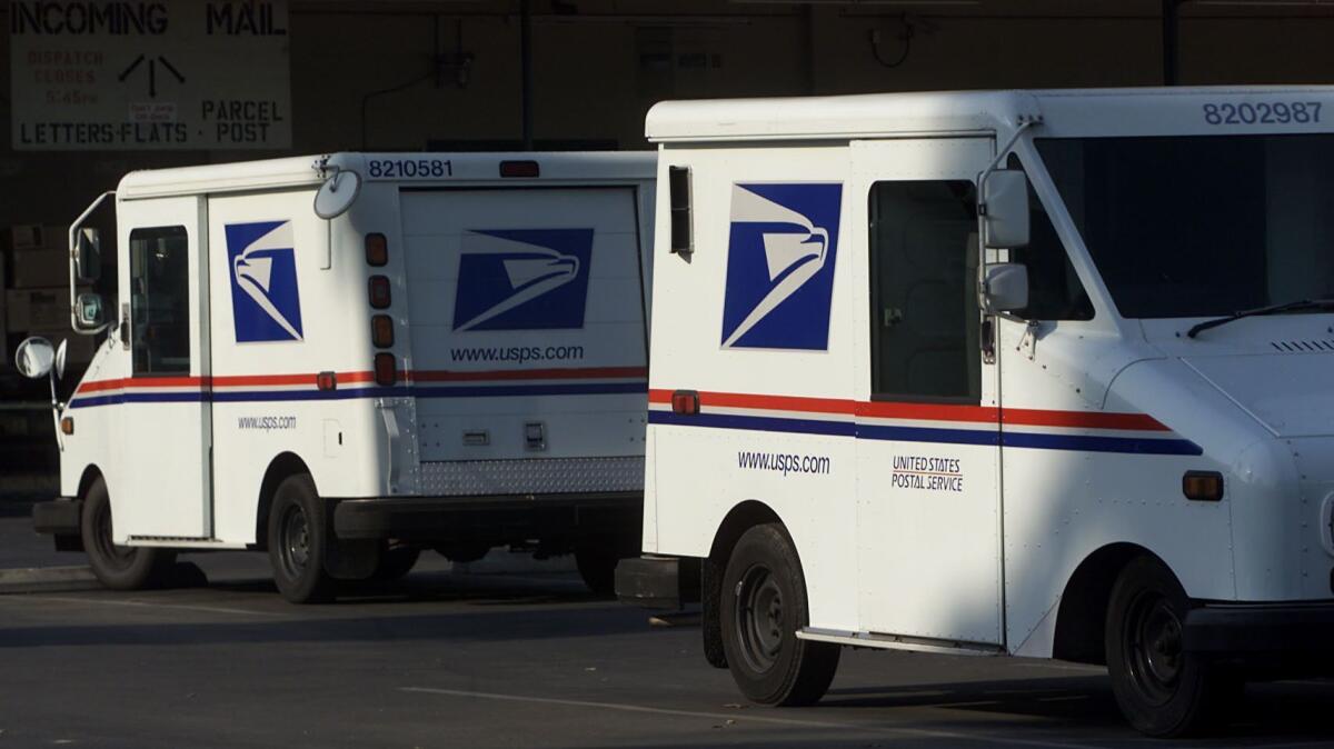 Sixteen letter carriers and clerks in the Atlanta area have been sentenced for transporting cocaine.