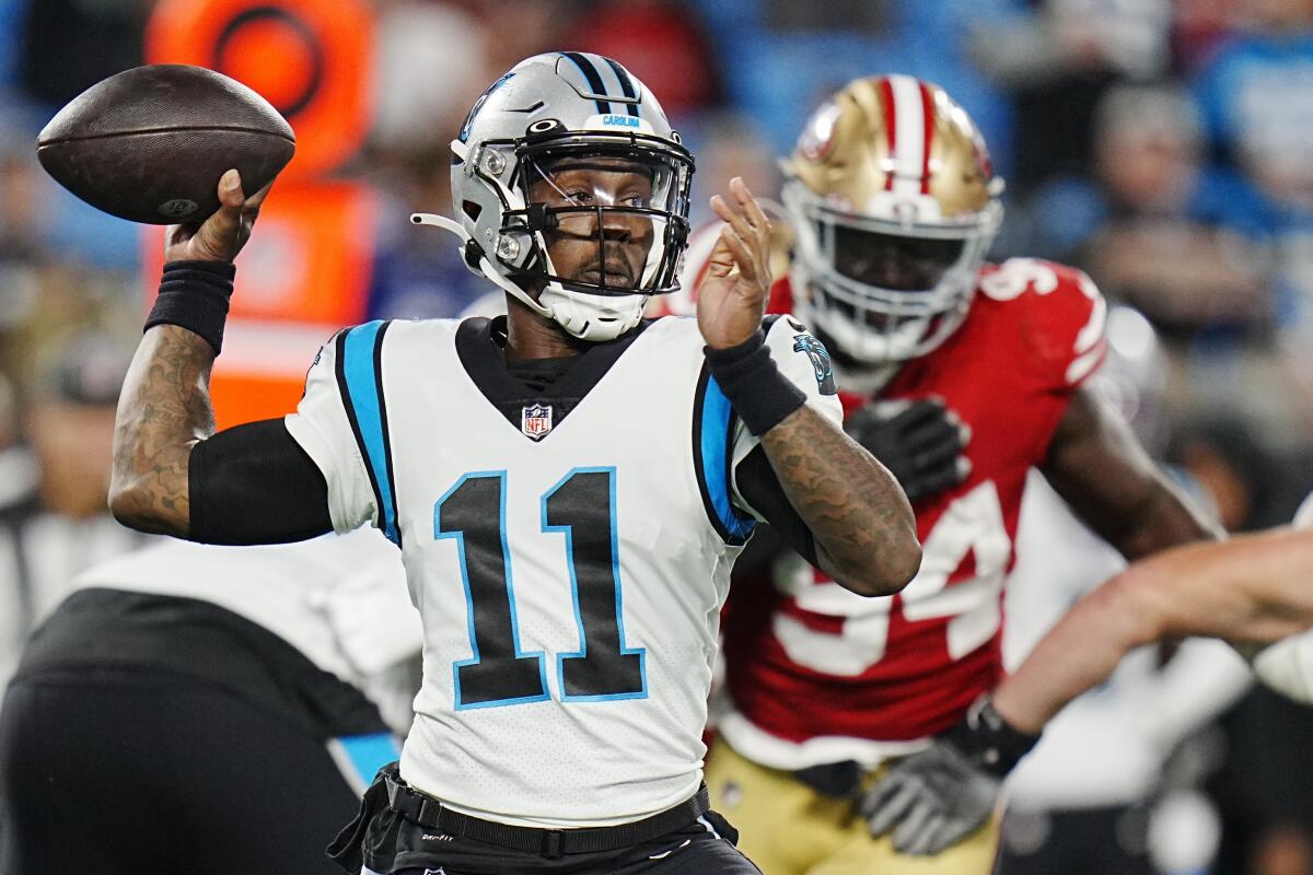 Carolina Panthers quarterback PJ Walker passes against the San Francisco 49ers during the second half an NFL football game on Sunday, Oct. 9, 2022, in Charlotte, N.C. (AP Photo/Rusty Jones)