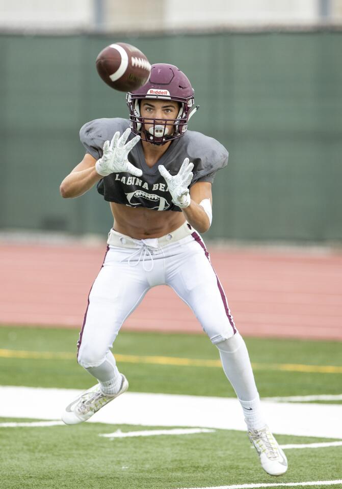 Laguna Beach's Kai Ball catches a pass during practice on Wednesday, August 15.