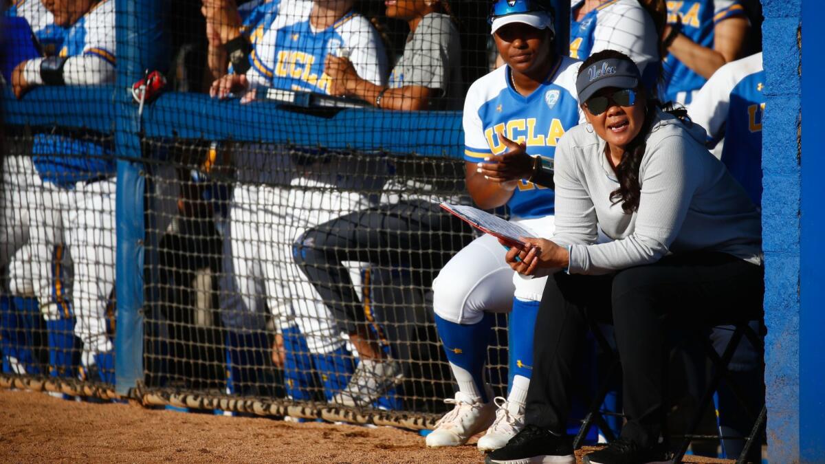 Kelly Inouye-Perez coaches the Bruins in an NCAA super regional softball game against James Madison on May 25 at Easton Stadium at UCLA on Saturday, May 25, 2019 in Los Angeles, Calif. (Kent Nishimura / Los Angeles Times)