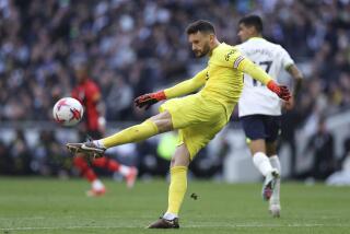 Tottenham's goalkeeper Hugo Lloris kicks the ball during the English Premier League soccer match.