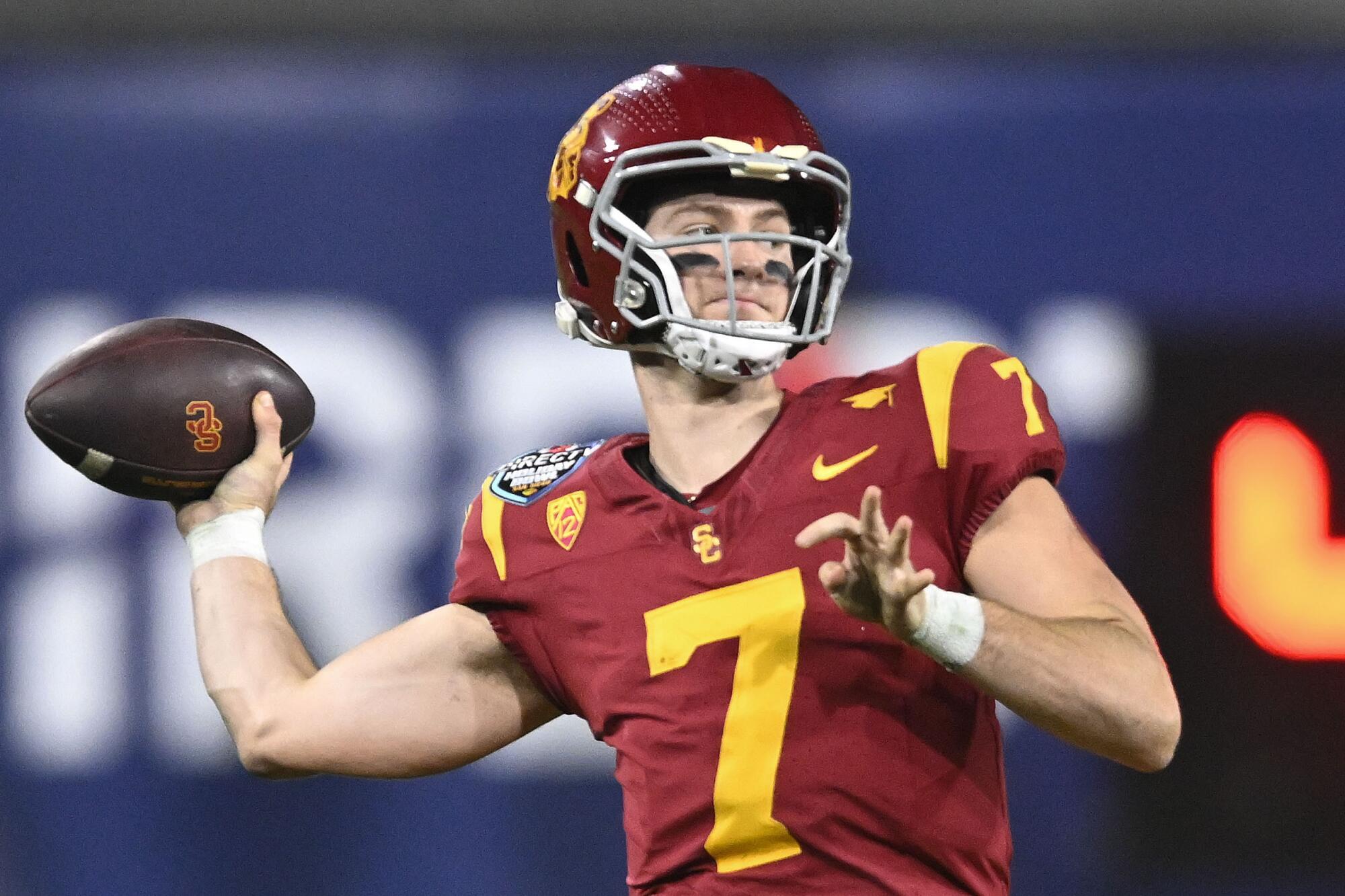 USC quarterback Miller Moss throws a pass during the Holiday Bowl against Louisville last season.