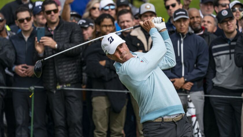 Matt Kuchar hits his tee shot on the 10th hole during his first round of the Genesis Open at Riviera Country Club on February 15, 2019.