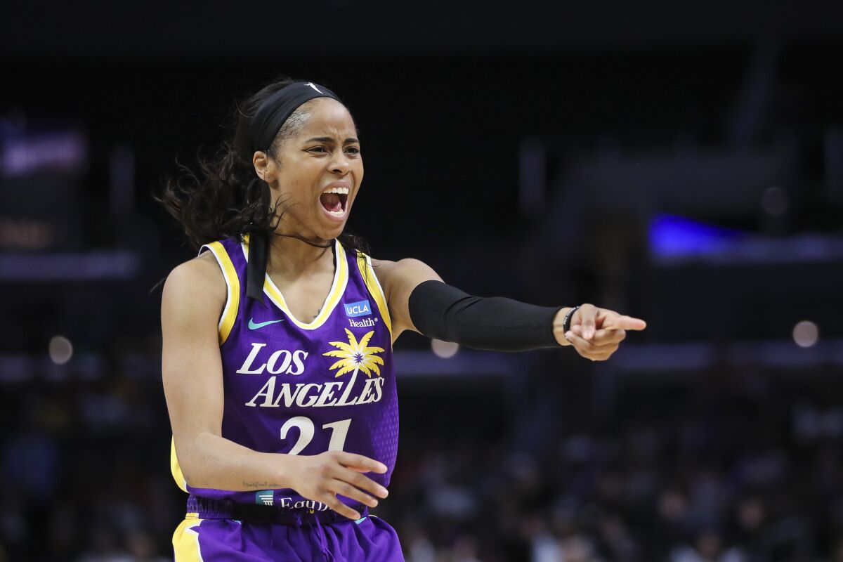Guard Jordin Canada of Sparks points during Tuesday's home opener 
