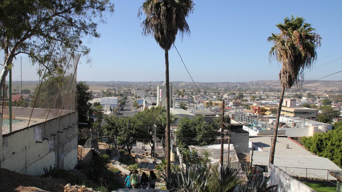 The view from Tijuana's Cerro Altamira. The bare hills in the distance are the United States.