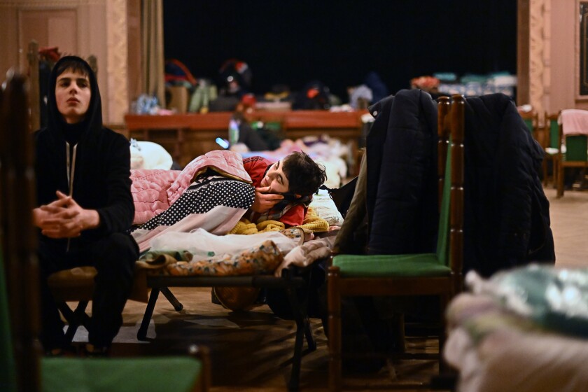 Przemysl, Poland March 7, 2022: Ukrainian refugees take shelter at the Ukrainian House in Przemysl, Poland Monday. The historical building is run by Ukrainians for its people and any guests of Przemysl. (Wally Skalij/Los Angeles Times)