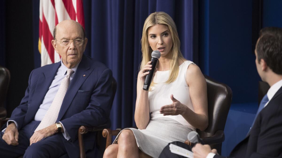 Ivanka Trump, now officially an assistant to President Donald Trump, sits next to Commerce Secretary Wilbur Ross during a recent town hall in Washington D.C. discussing the current "business climate" in the U.S.