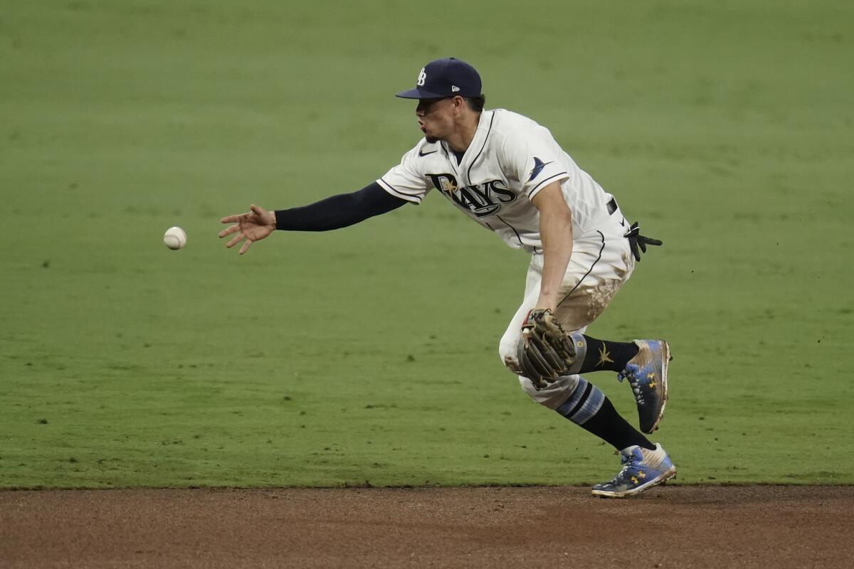 Tampa Bay Rays shortstop Willy Adames tries to catch.