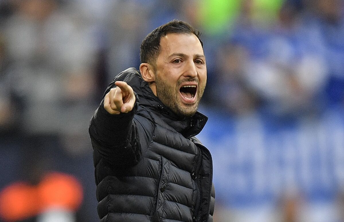 FILE - This time Schalke coach Domenico Tedesco reacts during the German Bundesliga soccer match between FC Schalke 04 and SC Freiburg in Gelsenkirchen, Germany, Feb. 16, 2019. Leipzig has hired former Schalke and Spartak Moscow coach Domenico Tedesco to replace American coach Jesse Marsch. (AP Photo/Martin Meissner, File)