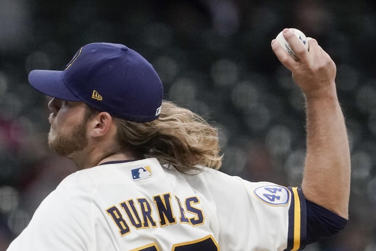 Burnes delivers with arm, bat as Brewers trounce Cubs 7-0 - The San Diego  Union-Tribune