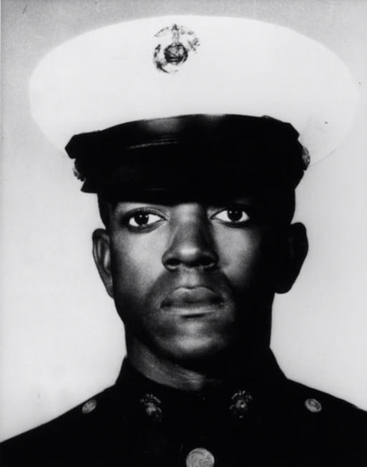 A black-and-white portrait of James Anderson Jr. in Marine Corps uniform