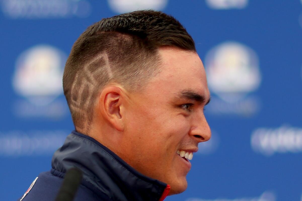 Rickie Fowler shows off his "USA" haircut Wednesday ahead of the Ryder Cup in Gleneagles, Scotland.
