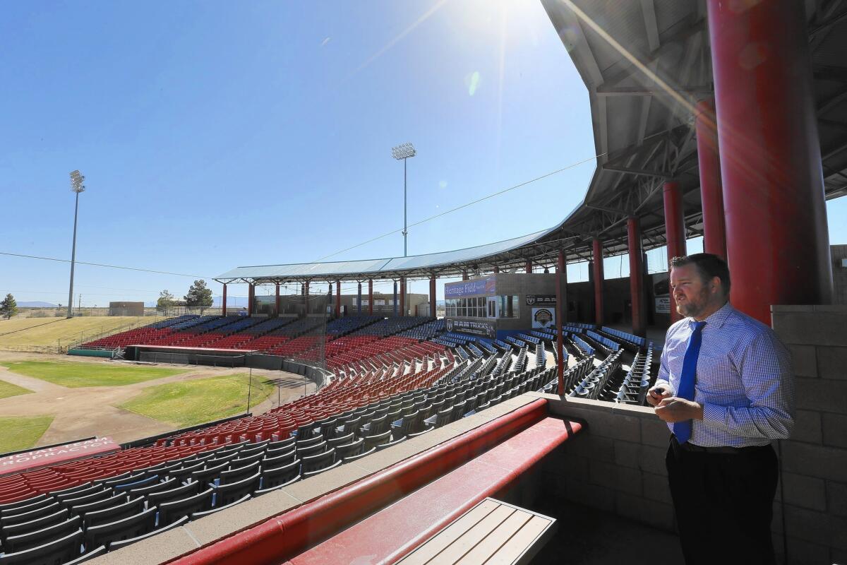 Ben Hemmen, general manager of the High Desert Mavericks minor league baseball club, looks out over the field in Adelanto.