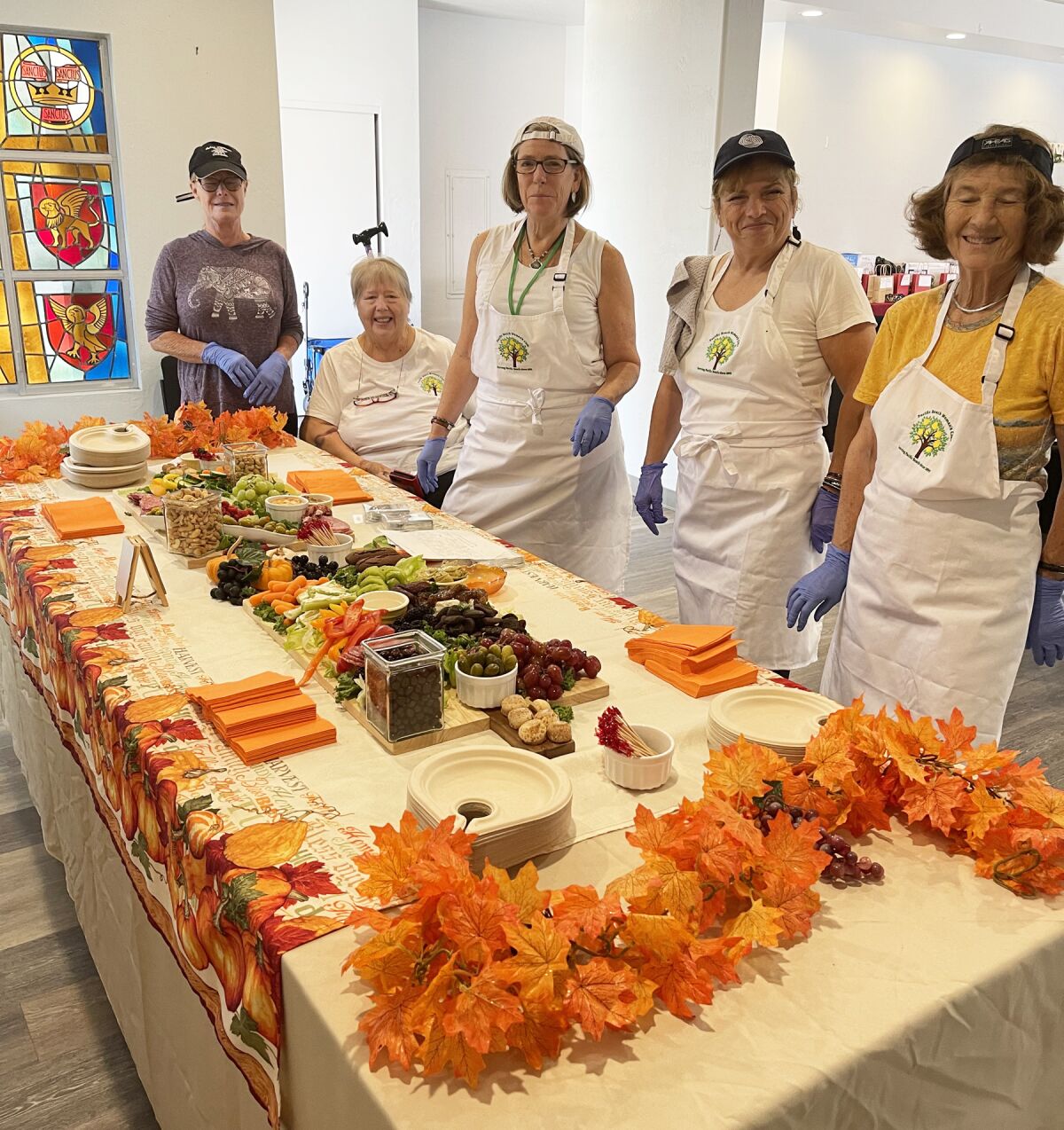 Pam Egan, Mary Lou Benzel, Kelly Laird, Cari Arn and Laurie Carlock at the Pacific Beach Woman’s Club Wine Festival in 2022.