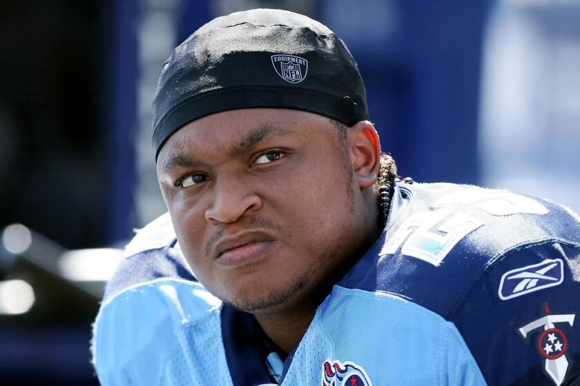 Tennessee Titans running back LenDale White, a former USC player, looks on during a game in 2008.