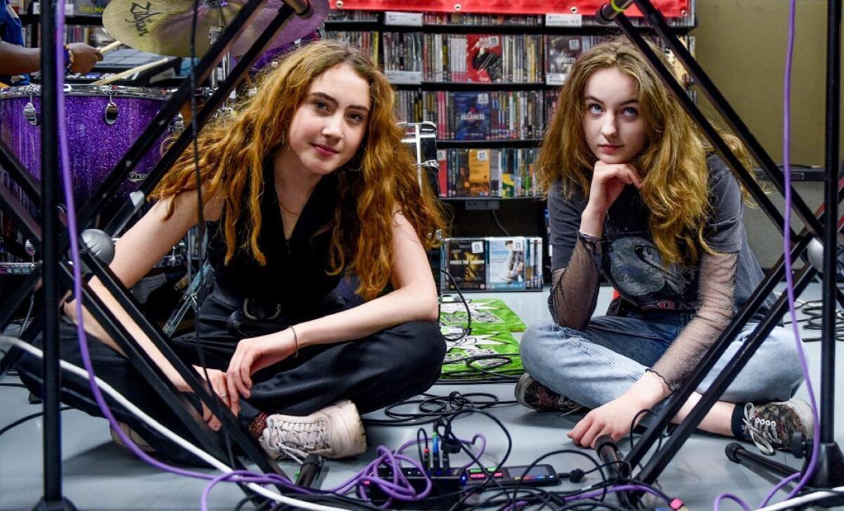 Rosa Walton, left, and Jenny Hollingworth are the English rock duo Let's Eat Grandma.
