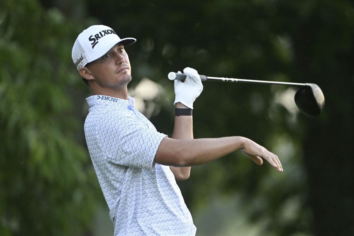 Max McGreevy watches his drive on the third hole during the third round of the Barbasol Championship golf tournament Saturday, July 9, 2022, in Nicholasville, Ky. (AP Photo/John Amis)