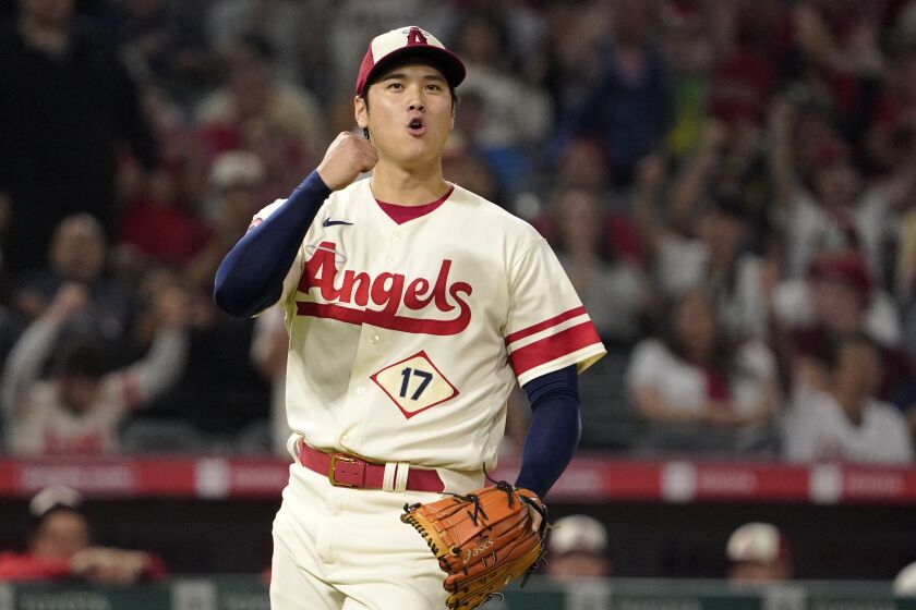 Los Angeles Angels' Shohei Ohtani pumps his fist after striking out Oakland Athletics' Vimael Machin 