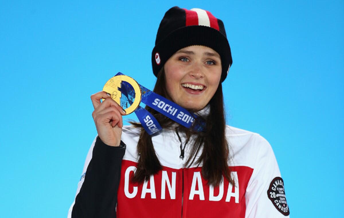 Canada's Marielle Thompson celebrates her gold-medal finish in the women's ski cross competition at the Sochi Winter Olympic Games on Friday.