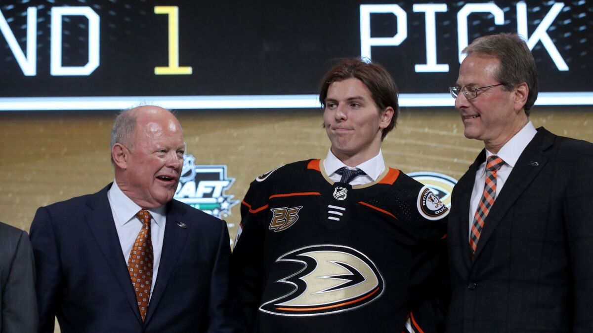 Isac Lundestrom poses after being selected by the Anaheim Ducks during the first round of the 2018 NHL Draft.