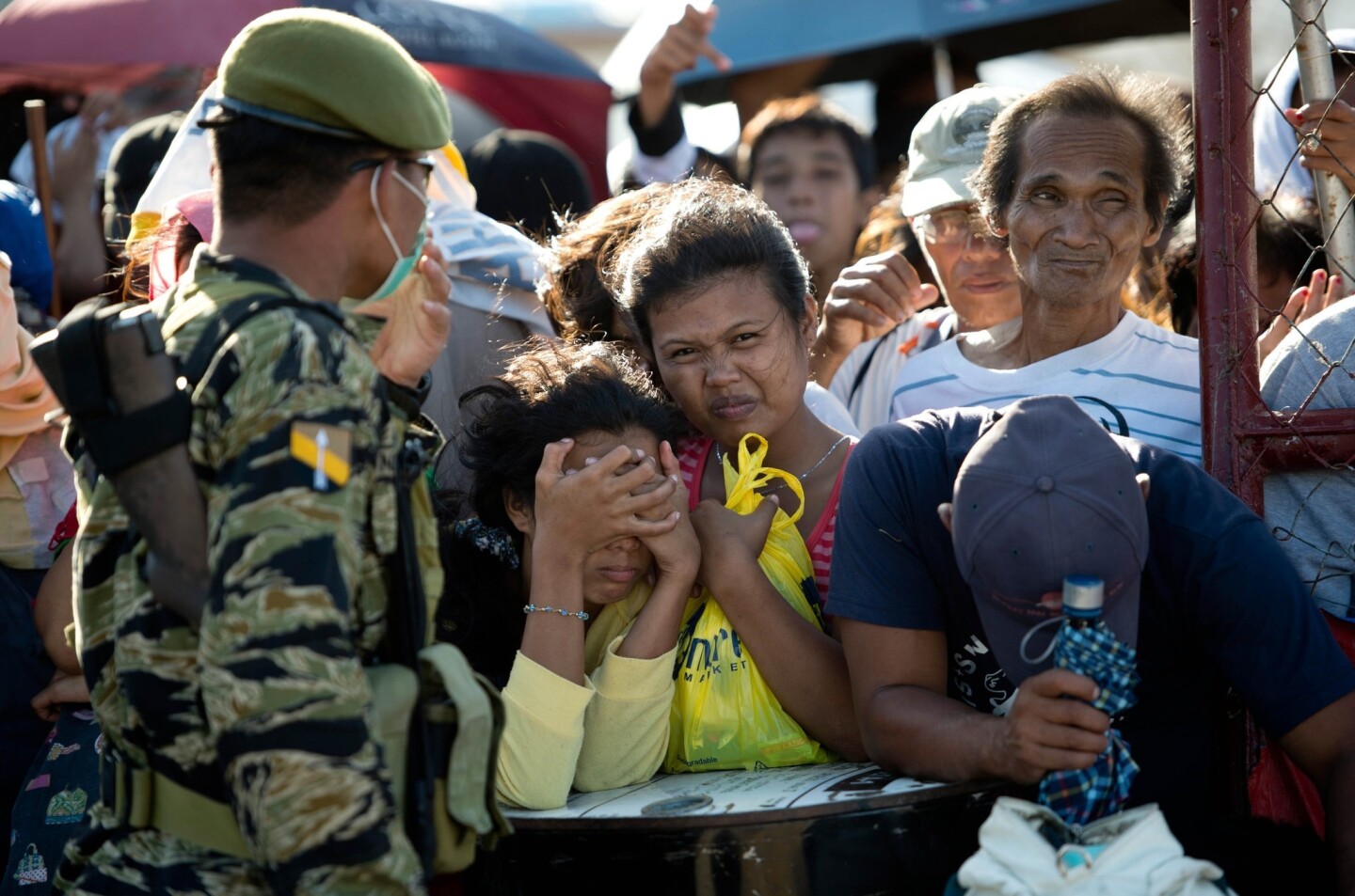 Residents wait to be evacuated at the airport in Tacloban, Philippines, which was devastated by Typhoon Haiyan.