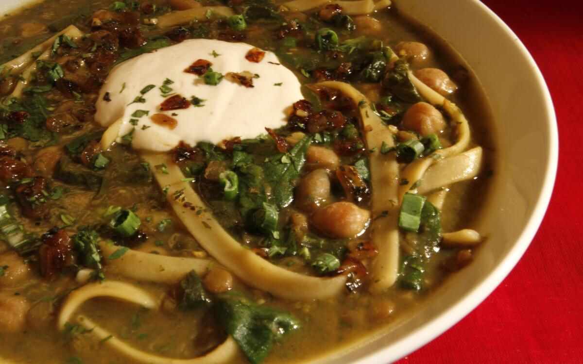 Chickpea and noodle soup with Persian herbs