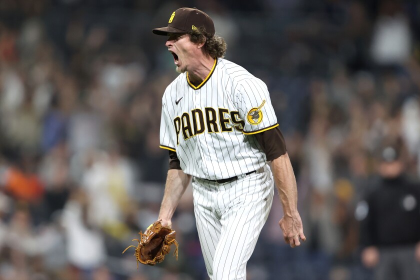 The Padres' Tim Hill reacts to striking out Mike Tauchman during the seventh inning of a game at PETCO Park on Friday.