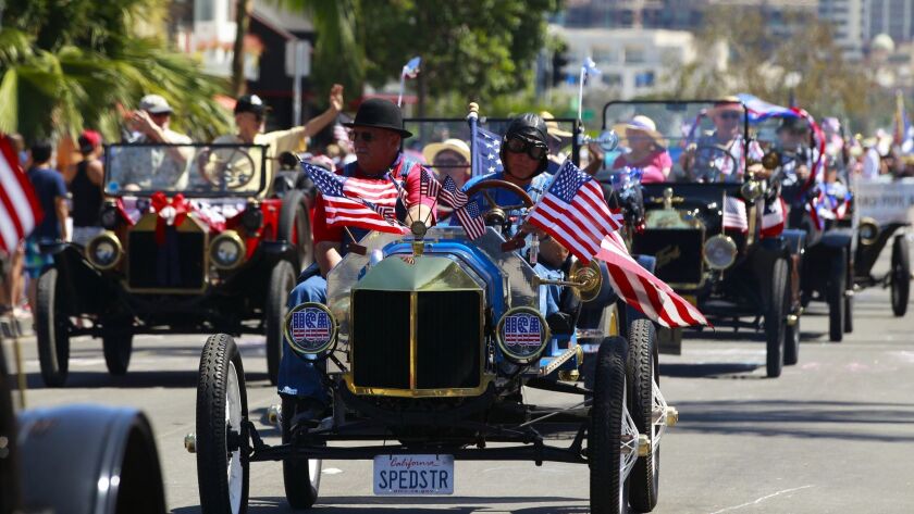 In this photo from 2016, vintage cars roll down the main route of the annual Fourth of July parade in Coronado.