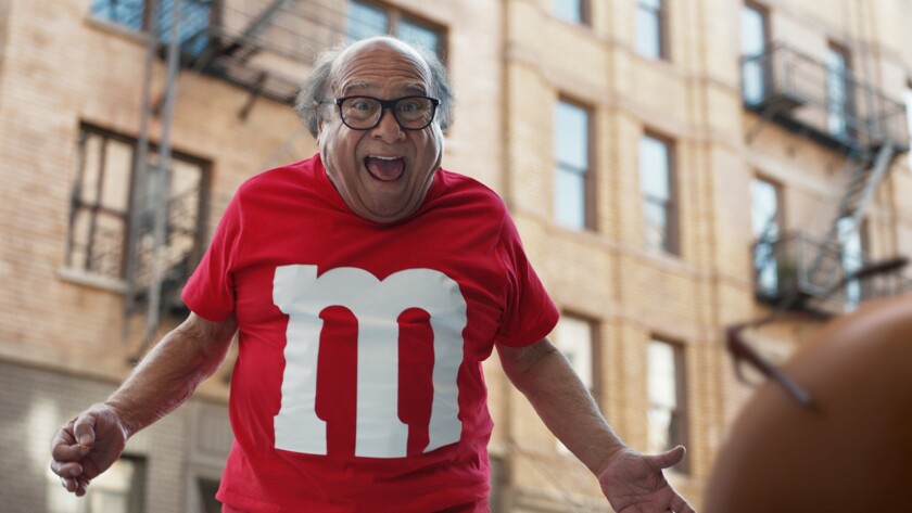 Actor Danny DeVito appears in a spot for M&M during the 2018 Super Bowl. Marketers paid NBC an average of $5 million per 30-second commercial to capture the attention of more than 100 million viewers.