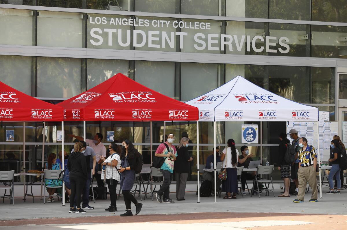 Students gather under tents at L.A. City College.