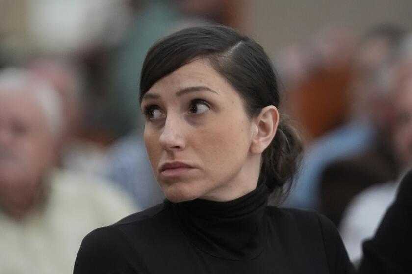 Kouri Richins, a Utah mother of three, who wrote a children's book about coping with grief after her husband's death and was later accused of fatally poisoning him, looks on during a hearing Wednesday, May 15, 2024, in Park City, Utah. (AP Photo/Rick Bowmer, Pool)