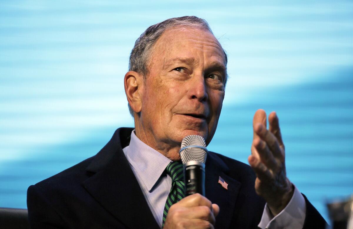 Democratic presidential candidate and former New York City Mayor Michael Bloomberg takes part in an on-stage conversation with former California Gov. Jerry Brown at the American Geophysical Union fall meeting in San Francisco last month.