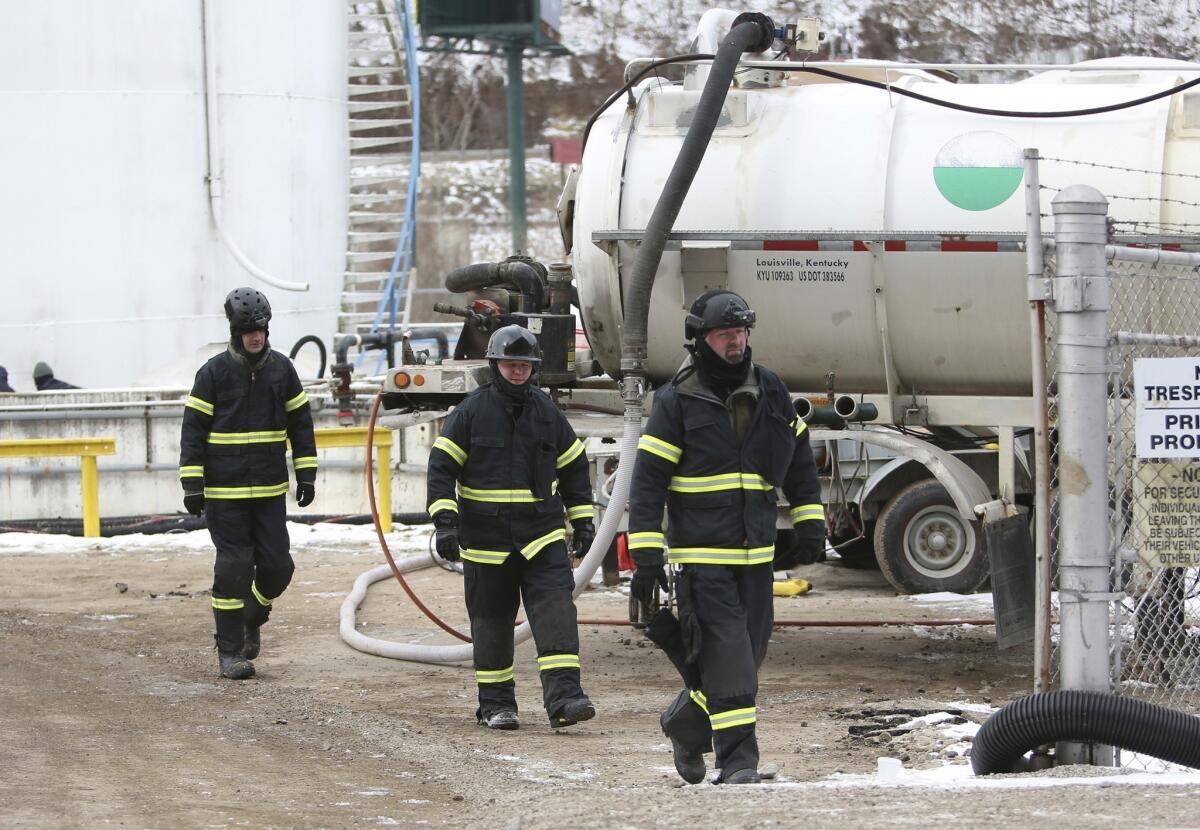 Members of the FBI Hazardous Materials Response Unit investigate the Freedom Industries site this week in Charleston, W.Va. The investigators are in the process of collecting documents, interviewing witnesses and collecting photographic evidence inside the tank that leaked Crude MCHM and PPH on Jan. 9.