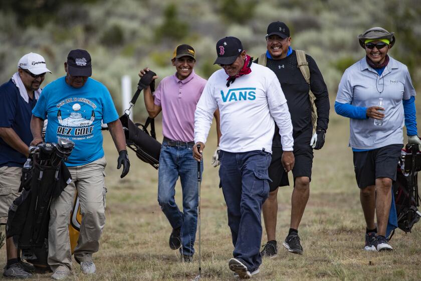 STEAMBOAT, AZ - JULY 20, 2019: Despite the heat, Indians enjoy playing in a tournament on the Rez Golf Course on the Navajo Reservation July 20, 2019 in Steamboat, Arizona. The course is on sprawling parched land filled with native sage, canyons and mostly dirt.(Gina Ferazzi/Los AngelesTimes)